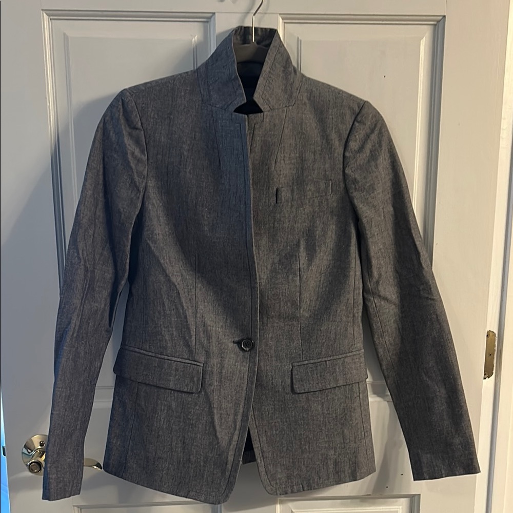 Stylish bluish gray blazer. New but no tags.